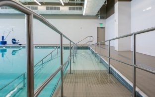 An accessible entrance to a swimming pool. 