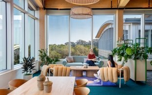 People sitting on couches in a lounge area