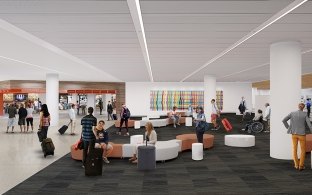 An open seating area with a few couches and chairs