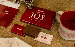 A spread of McCarthy branded holiday goods likes cards and chocolate