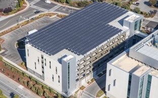 Aerial view of solar panels on top of the building