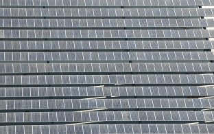 Aerial view of the solar panels on top the building