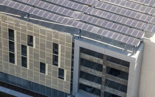 Another view of the solar panels on top of the building 
