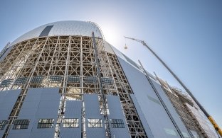 Exterior view of the hangar under construction