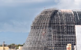 Exterior view of the hangar under construction