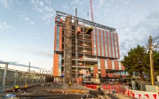 Exterior image of the IQHQ building under construction