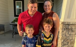 Joe with his wife Kara, and sons Hank and Ford.