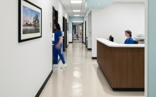 A nurses station and hallway in the clinic