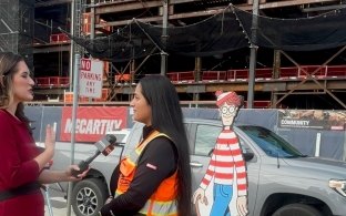 A person being interviewed by news media