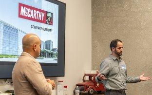 Felton presenting at a McCarthy-hosted United Hispanic Contractors Association event