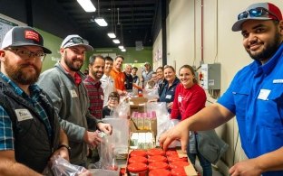 Felton with other McCarthy employees volunteering at the Omaha Food Bank