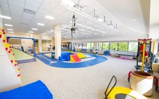 A room with various rehabilitation equipment