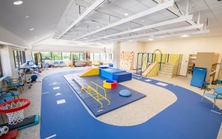 A room with various rehabilitation equipment