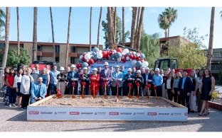 A group of people posed at a groundbreaking ceremony