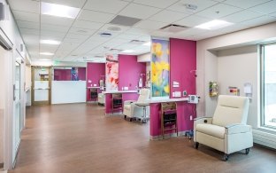 A treatment area with multiple chairs for patients