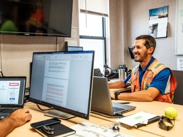 Person working at computer.