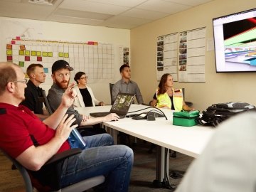 People at a jobsite having a meeting.