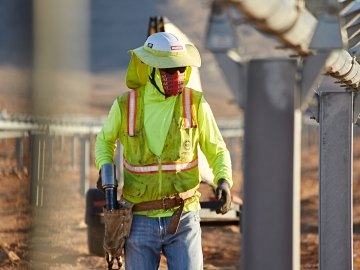 Construction worker on a solar project site.