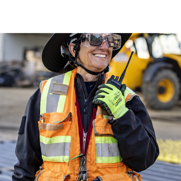 employee smiling in safety gear