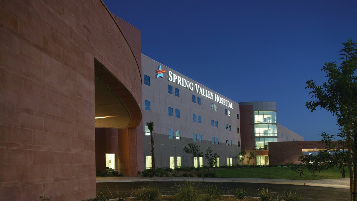 Exterior view of spring valley hospital at nighttime