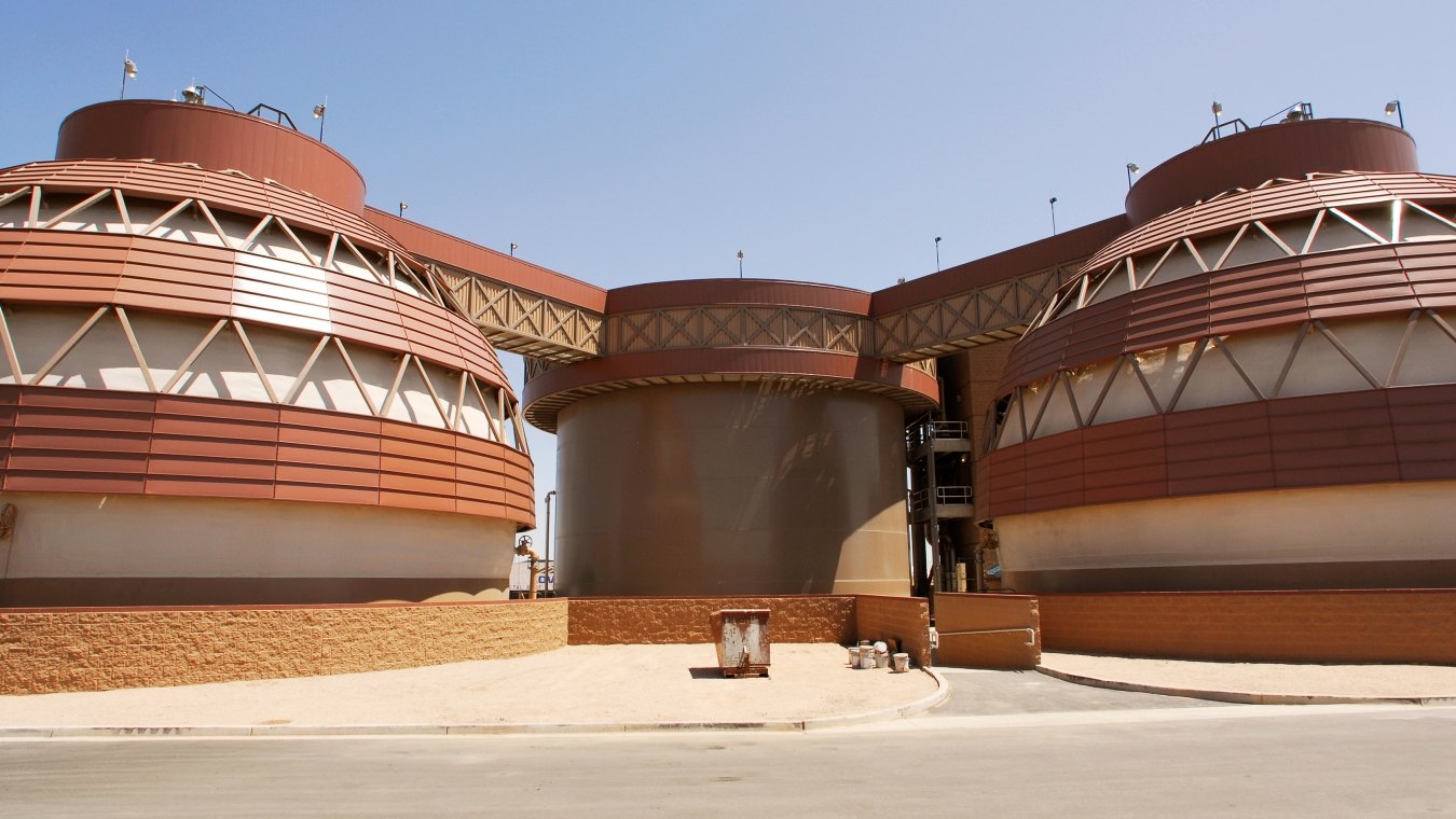 The futuristic brown and beige tanks at the Greenfield Water Reclamation Facility. 