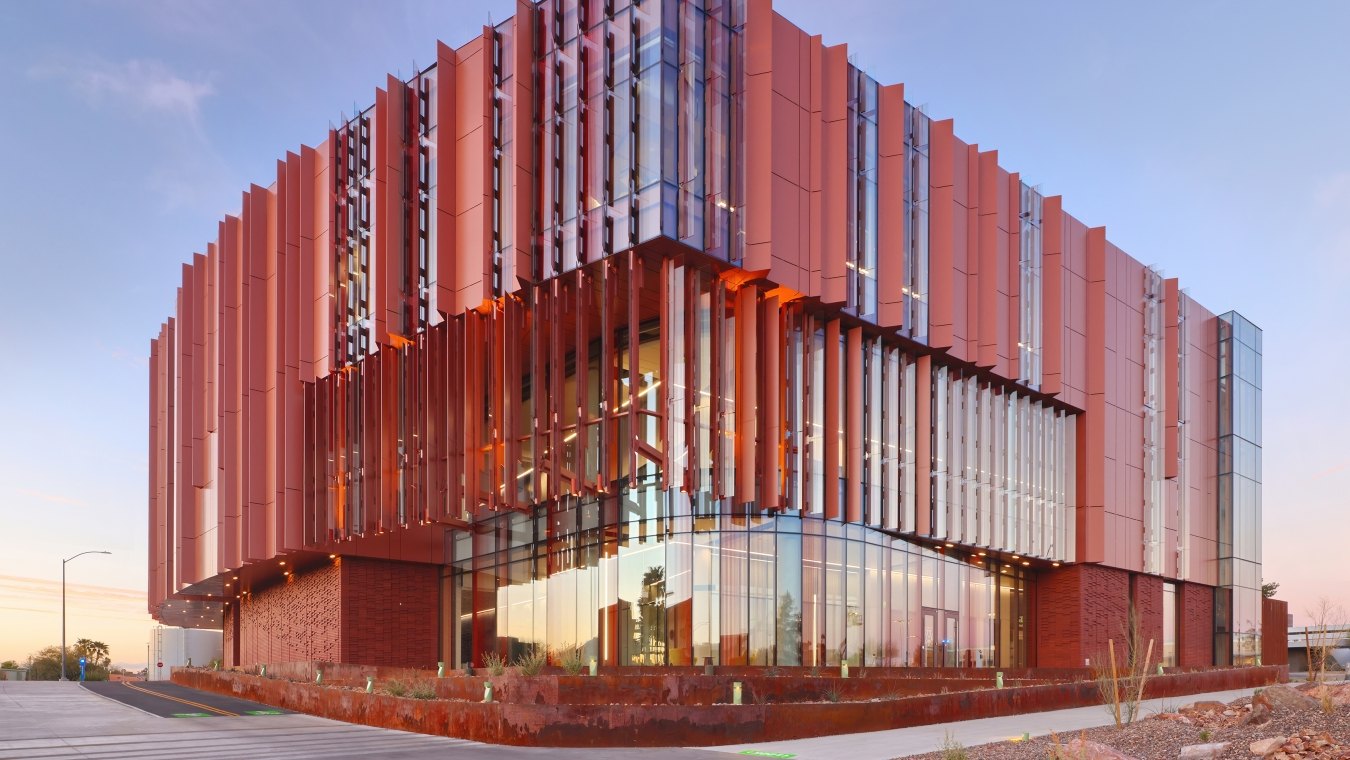 Outdoor image of the building with windows and panels sticking out