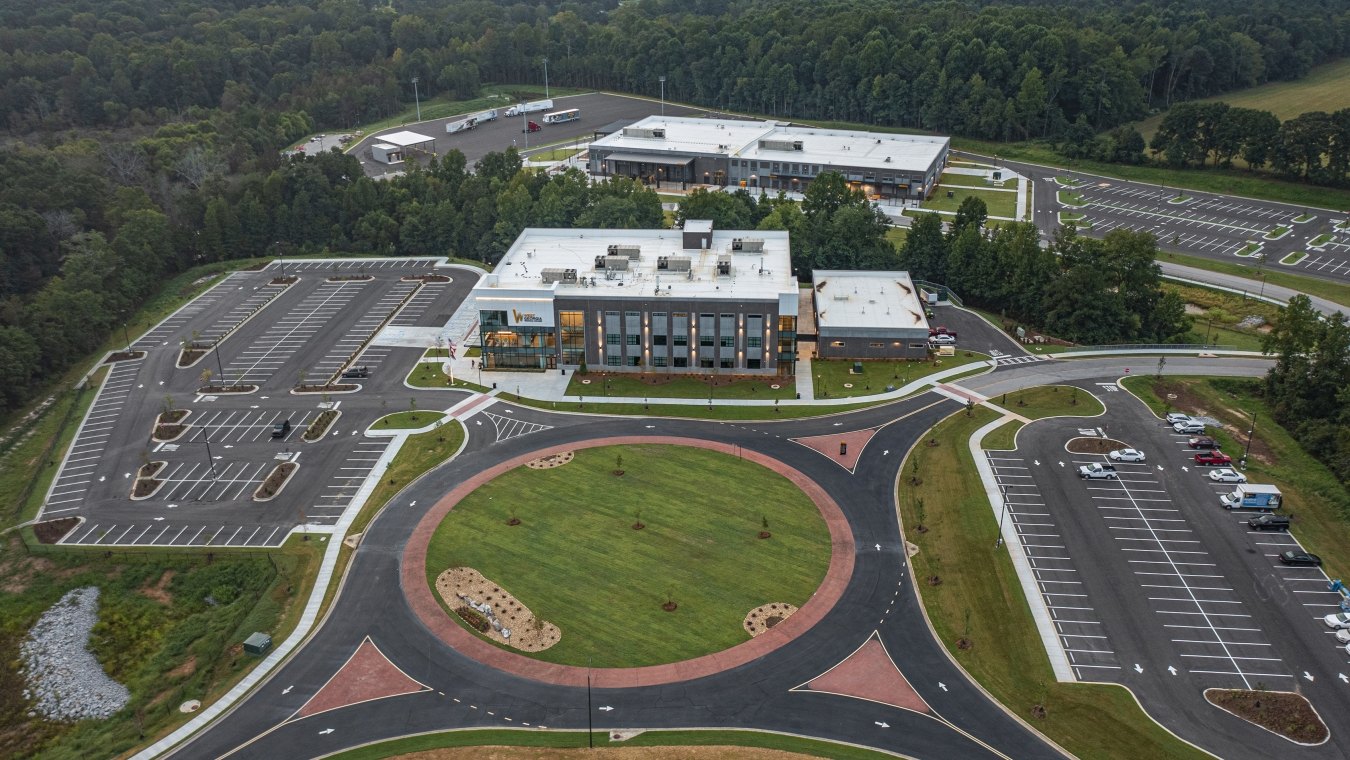 Exterior aerial view of the Carroll Campus building and landscaping. 