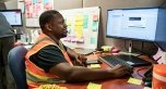 employee at computer desk