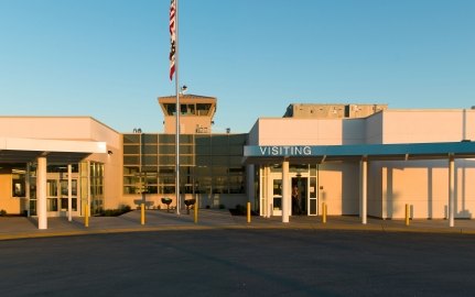 Housing and Healthcare Facility Stockton Entrance with U.S. Flag