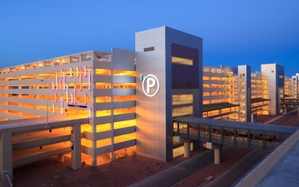 Exterior view of the parking garage at night.