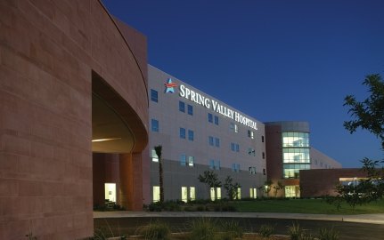 Exterior view of spring valley hospital at nighttime