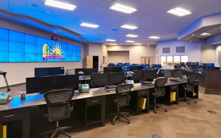 Chairs and computers at dozens of workstations in the emergency facility.