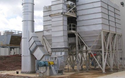 Outdoor image of the recycling plant with a metal tube