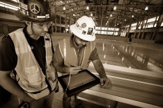 Two construction workers on a jobsite.