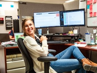 Person working at computer.