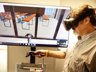 Person using virtual reality headset. 