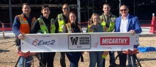 People holding beam at Arizona Western College 