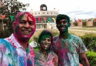 Swamy and family celebrating Holi in India