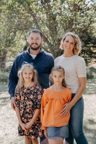 Kris Montgomery with wife and kids