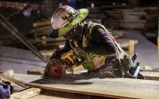 A person using a saw