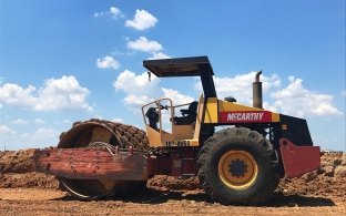 Heavy civil machinery with McCarthy's logo