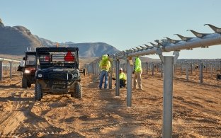 A group of people working at a renewable energy jobsite