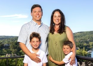 Joe with his wife Kara, and sons Hank and Ford.