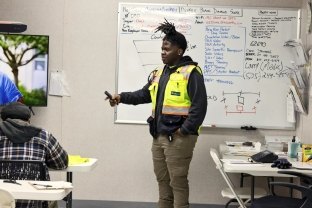 Cam Courtney hosting a safety orientation on the jobsite.