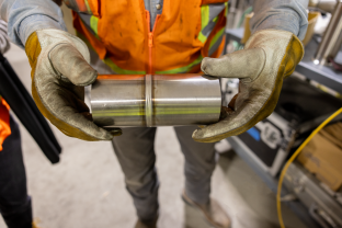 Section of sanitary process piping using an orbital welding technique