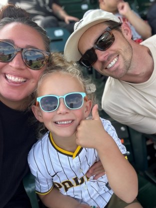 Tyler with his family at a Padres Game
