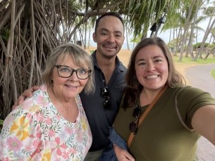 Three people posing for a selfie