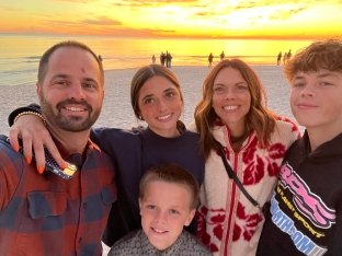 Felton with his family at the beach
