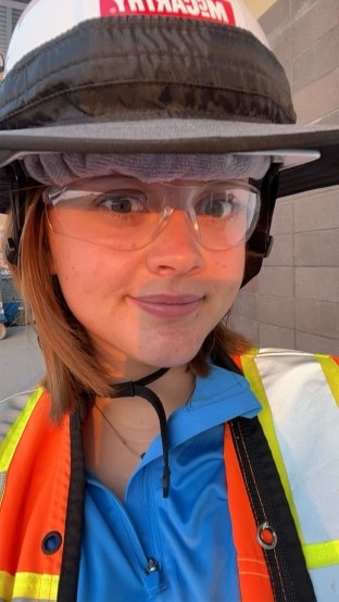 A selfie of a person wearing PPE