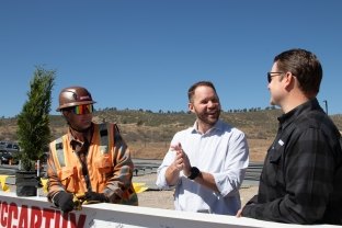 Daniel Herr (center) alongside McCarthy project team members at the topping out ceremony for the Colorado State University Advanced Technology Lasers for Applications and Science (ATLAS) Facility project.
